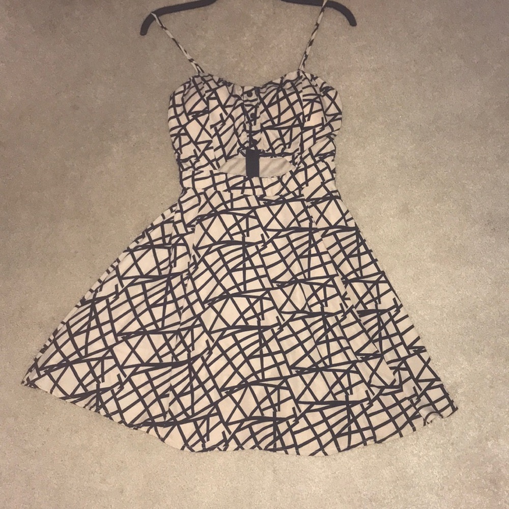 Patterned fit and flare sun dress with key hole